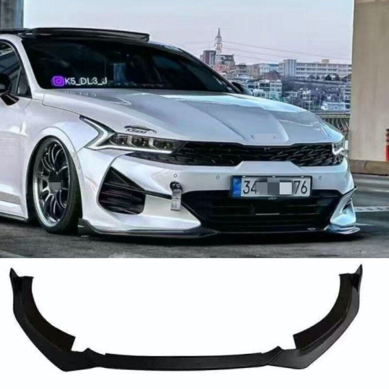 Kia K5 DL3 front lip installed on white sedan