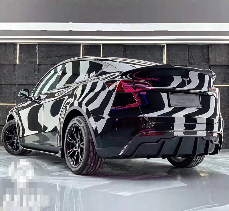 Tesla Model Y FAST-style hydro carbon full kit rear three quarter view