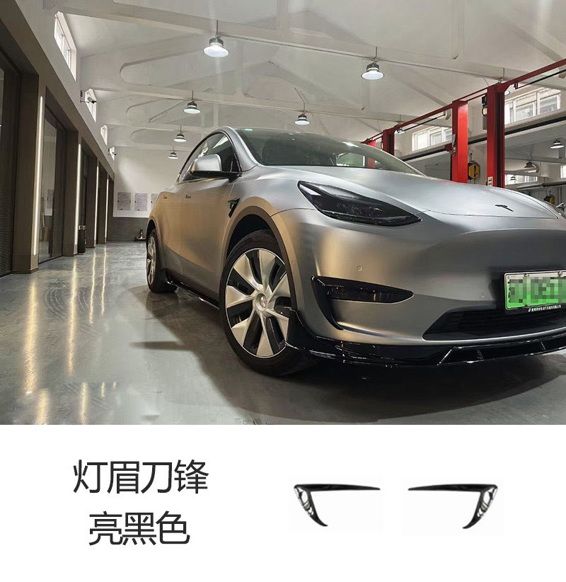 Tesla Model Y FAST-style gloss black headlight eyebrow blade trim