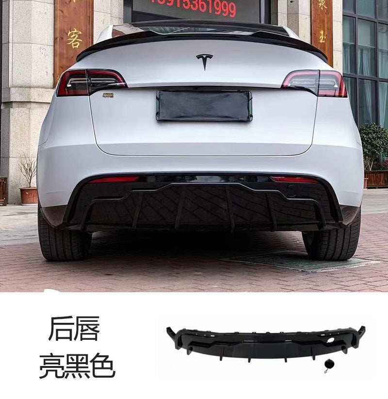 Tesla Model Y FAST-style gloss black rear diffuser installed