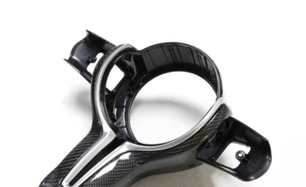 BMW M steering wheel carbon fiber trim detail