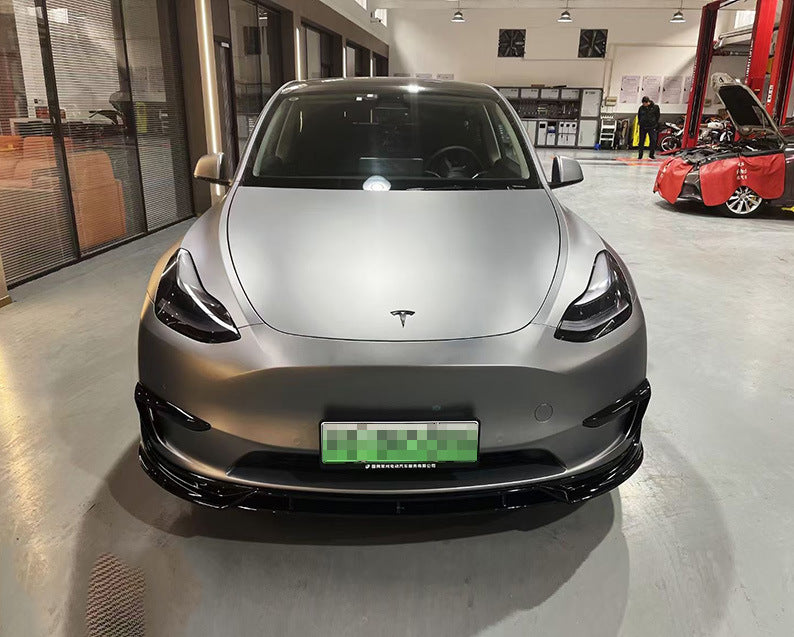 Tesla Model Y FAST-style gloss black front lip installed
