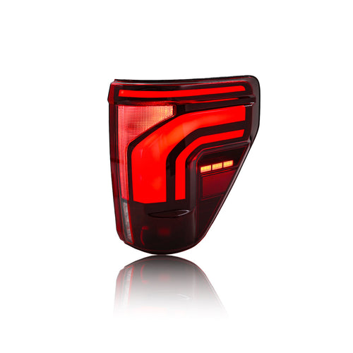 Ford F-150 smoked LED tail lamp illuminated red signature
