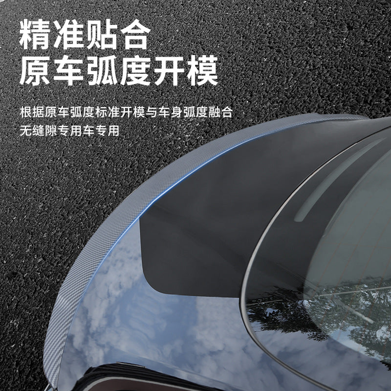 Close-up fitment of Tesla performance-style rear spoiler